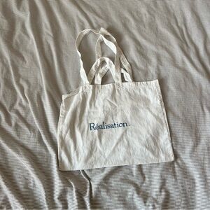 Realisation Par Cream Tote with Blue Logo